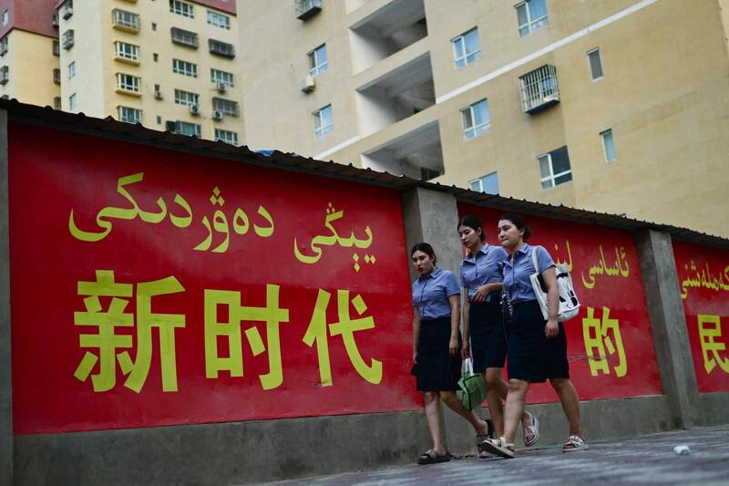 中國1日起開始實施「民族團結進步促進法」，中共中央黨校學者表示，此舉標誌著北京當局的施政重心，已從處理具體的民族事務，轉向民族同化。（法新社檔案照）