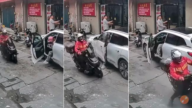 山东女子停车“开门杀” 又被“反杀” 画面曝光 山东女子停车“开门杀” 又被“反杀” 画面曝光